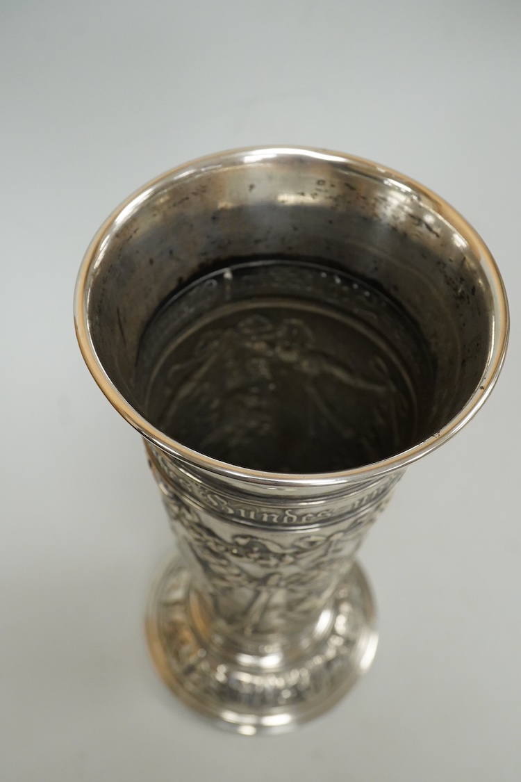 A late 19th century German 800 standard white metal 25th anniversary commemorative vase, embossed with figures, swags and ribbons, 20.9cm, 7.6oz.